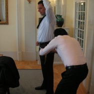 On site tailor visiting his client.